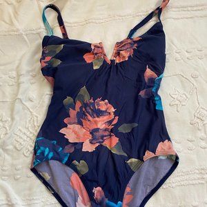 Flattering, floral, plunging V-neckline swimsuit